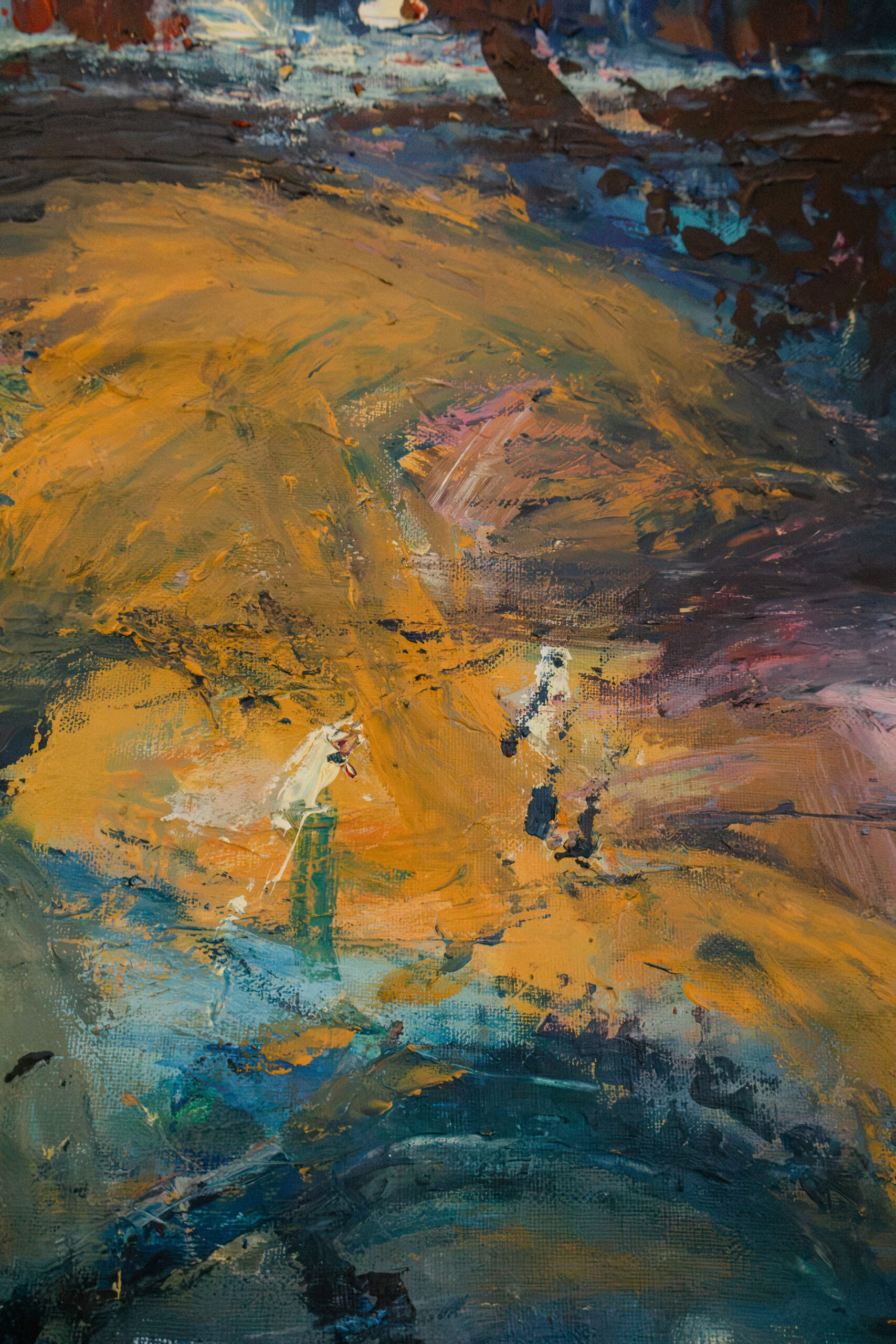 Close-up of an oil painting by Leonoor Ruigrok, showing layered ochre yellow, blue and dark paint with visible brushstrokes and texture.